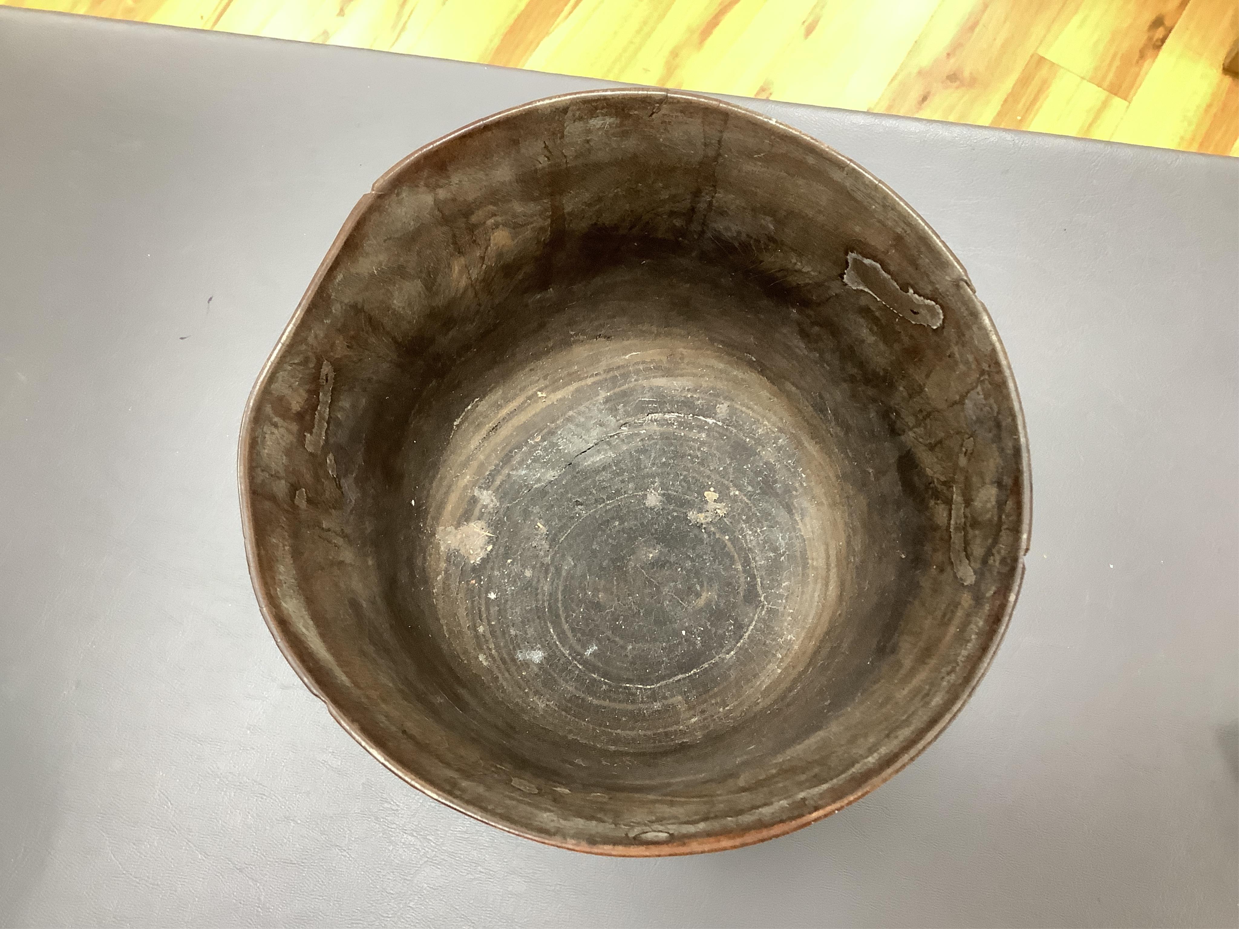 An 18th/19th century lignum vitae wassail bowl and a circular mahogany tobacco box, largest 18cm high